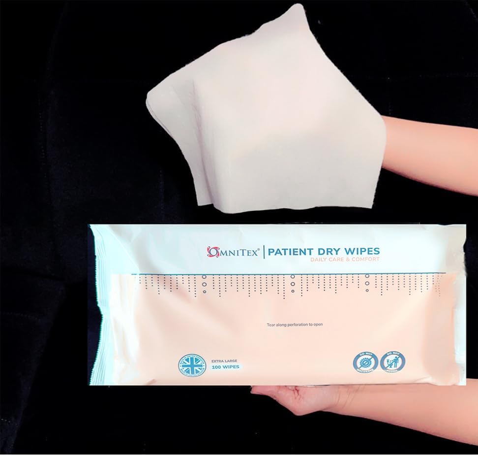 Omnitex extra large dry wipe held above the 100-wipe pack for scale