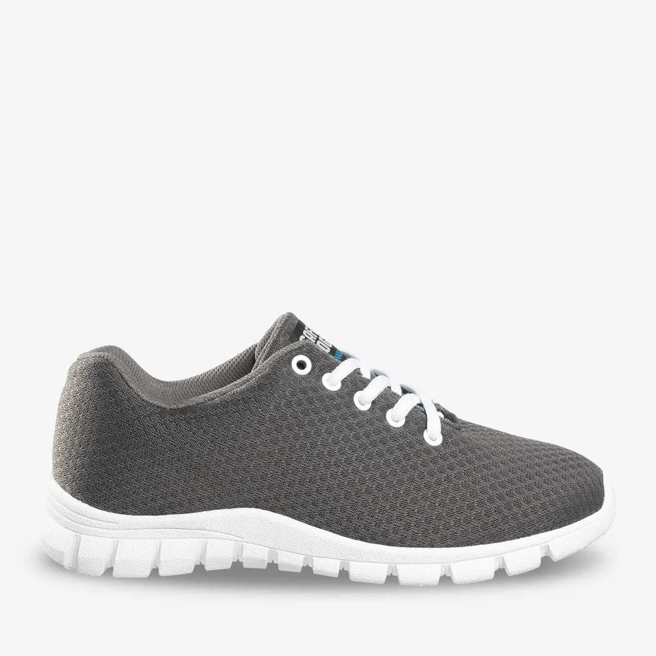 Kassie unisex professional shoes by PLS Medical, showing a sleek black design with comfortable slip-on style and sturdy sole.
