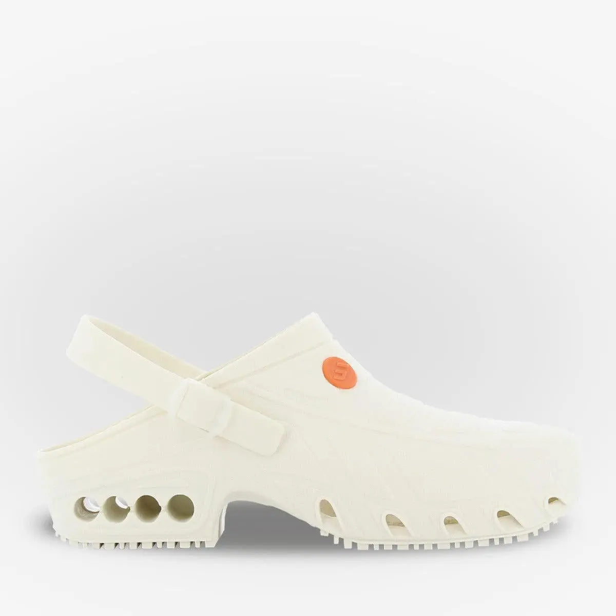 OxyClog autoclavable nursing clog by PLS Medical, featuring a slip-on design in blue with a cushioned sole and adjustable heel strap.