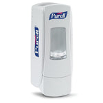 Purell ADX-7™ hand sanitizer dispenser mounted on wall, white plastic design with pump, for commercial hand hygiene.