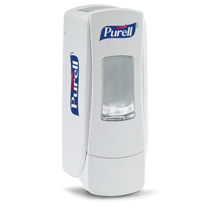Purell ADX-7™ hand sanitizer dispenser mounted on wall, white plastic design with pump, for commercial hand hygiene.