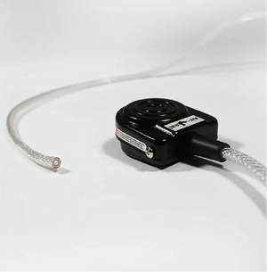 Medical footswitch with clear flexible tubing on a white background