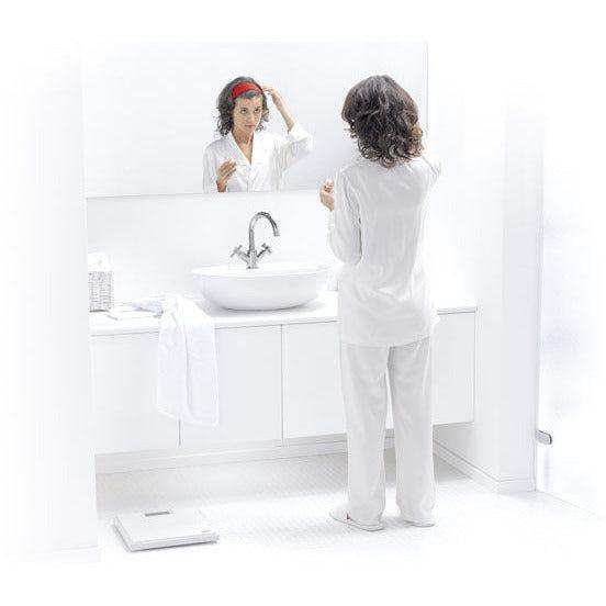 Black Seca 803 Clara digital personal scale with sleek design and digital display, used for non-medical weight measurement.