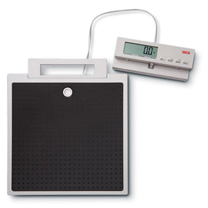 SECA 869 flat scales with cable remote display for non-medical use, showing a digital weighing platform with display unit