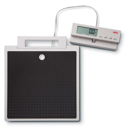 SECA 869 flat scales with cable remote display for non-medical use, showing a digital weighing platform with display unit