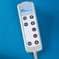 Seers Medical remote control for adjustable medical bed on blue background