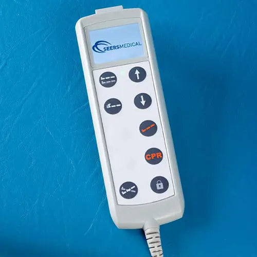 Seers Medical remote control for adjustable medical bed on blue background
