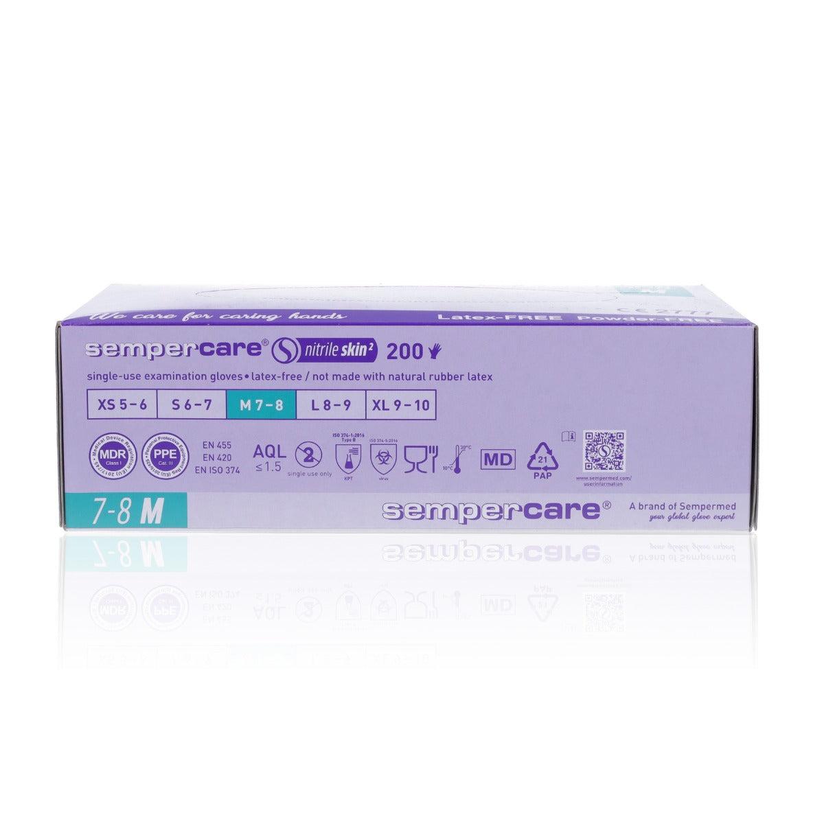 Pair of SemperMed Skin2 nitrile gloves in medium size, stacked with 200 gloves shown in the image.