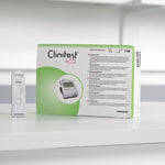 Siemens Clinitek Status+ Clinitest HCG test kit box with 25 tests for pregnancy detection and urinary analysis.