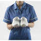 Toffeln Ezi-Klog unisex nursing shoes, lightweight clogs with slip-resistant soles, shown in a neutral color.