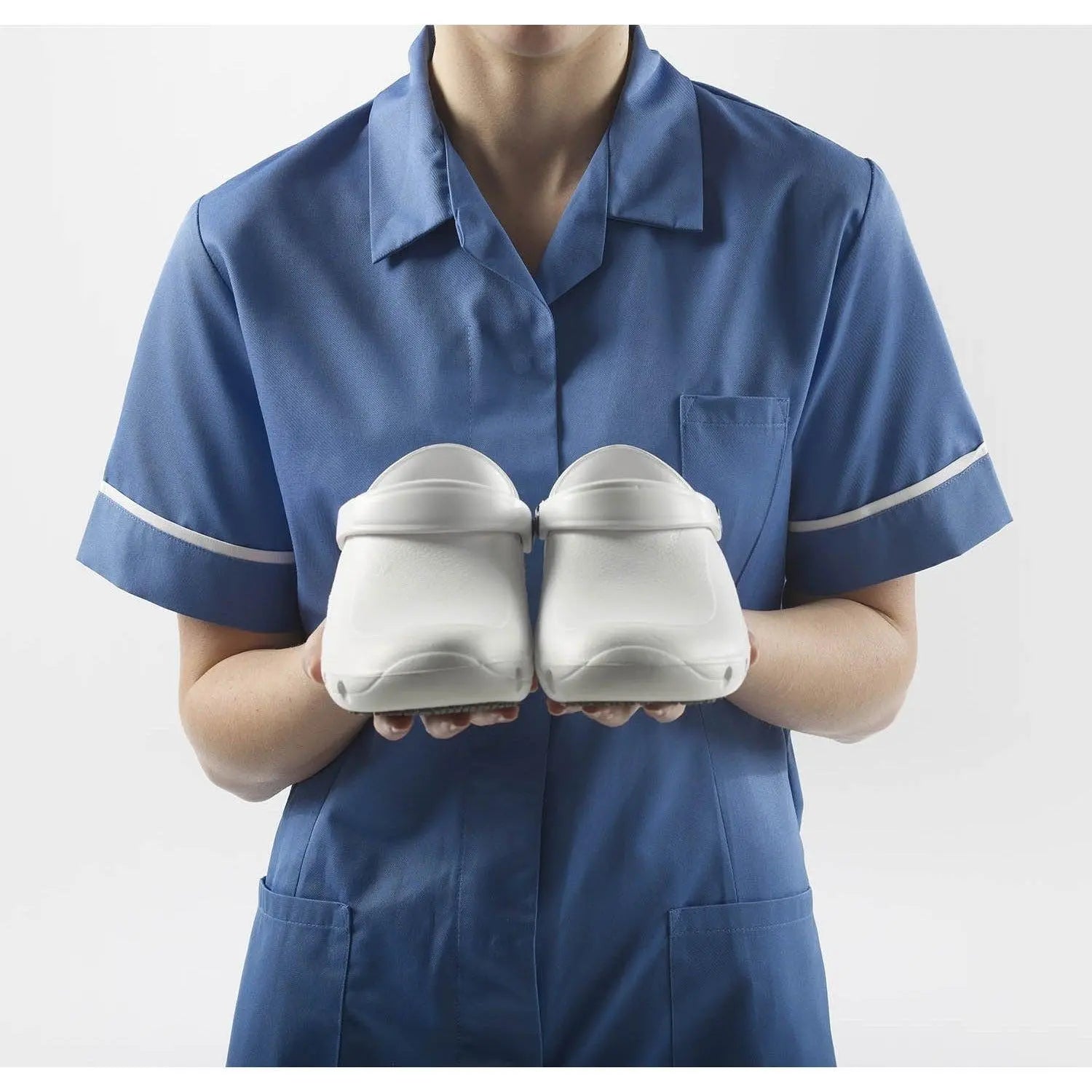Toffeln Ezi-Klog unisex nursing shoes, lightweight clogs with slip-resistant soles, shown in a neutral color.