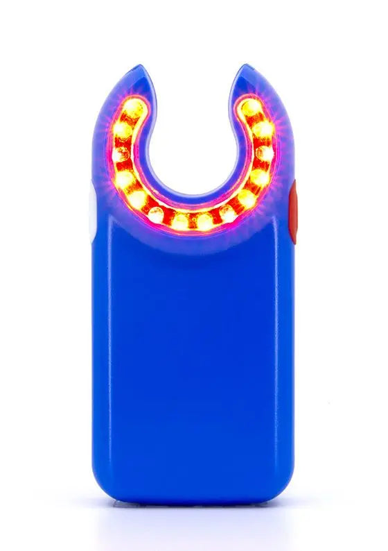 Blue medical device with red LED safety lights illuminated, white background