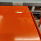 Orange lid and base of Wybone 28-litre hybrid sackholder with a sturdy design and ample capacity for waste collection.