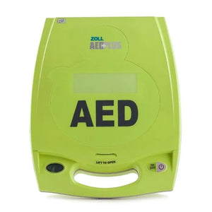 Front view of a green AED defibrillator with clear display and control buttons